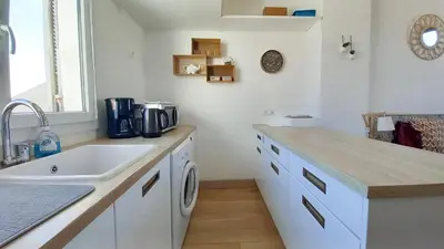 Cuisine ou kitchenette dans l'établissement Palais Gounod
