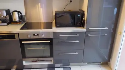 Cuisine ou kitchenette dans l'établissement Les Grenadines du samedi au samedi