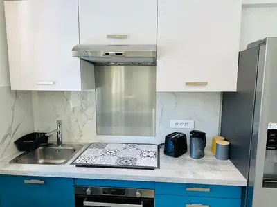 Cuisine ou kitchenette dans l'établissement Cosy Studio à deux pas de la plage, de la gare et du palais des congrès