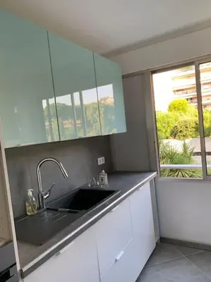 Cuisine ou kitchenette dans l'établissement La Pinède - Appartment 3 bedrooms