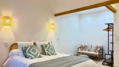 Un ou plusieurs lits dans un hébergement de l'établissement La Bohème Cosy Apt Near Beach AC Near festival