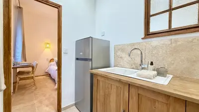 Cuisine ou kitchenette dans l'établissement La Bohème Cosy Apt Near Beach AC Near festival