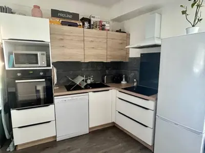 Cuisine ou kitchenette dans l'établissement Appartement familial entre Cannes et Juan-les-Pins
