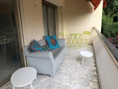 Coin salon dans l'établissement CANNES Martinez- family apartment 100m2