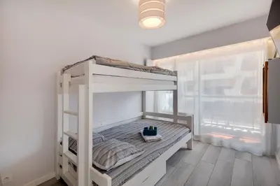 Un ou plusieurs lits dans un hébergement de l'établissement LE SYLVAPLANA JUAN LES PINS Terrasse 30m2