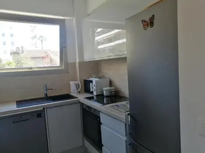 Cuisine ou kitchenette dans l'établissement Résidence Côte d'Azur Cannes