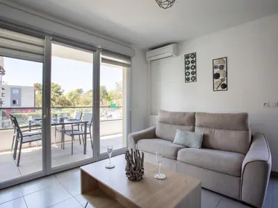 Coin salon dans l'établissement Apartment L'Orée du parc by Interhome