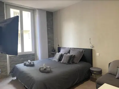 Un ou plusieurs lits dans un hébergement de l'établissement PACA Properties 41H2 - Studio cosy