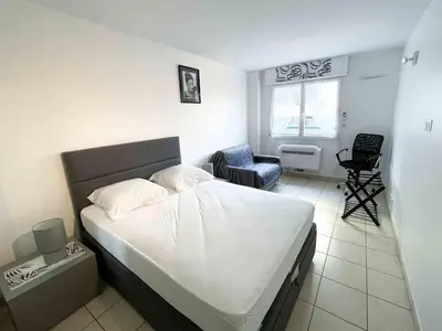 Un ou plusieurs lits dans un hébergement de l'établissement Modern one bedroom apartment in Cannes