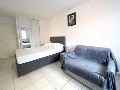 Un ou plusieurs lits dans un hébergement de l'établissement Modern one bedroom apartment in Cannes