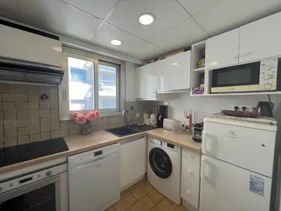 Cuisine ou kitchenette dans l'établissement Alexandra apartment by Welcome to Cannes