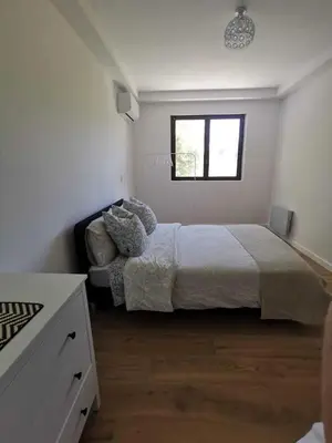 Un ou plusieurs lits dans un hébergement de l'établissement Bas de Villa au Calme