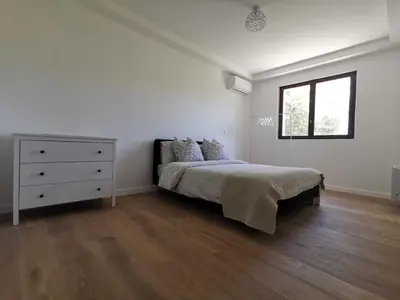 Un ou plusieurs lits dans un hébergement de l'établissement Bas de Villa au Calme