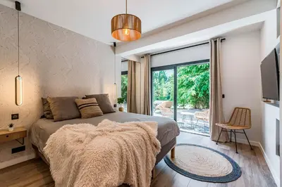 Un ou plusieurs lits dans un hébergement de l'établissement Totolulu Cannes Luxury Properties - La Villa